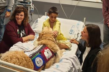 Lee toda la noticia 'El Hospital 12 de Octubre pionero en aliviar el dolor de los niños ingresados usando terapia con perros'